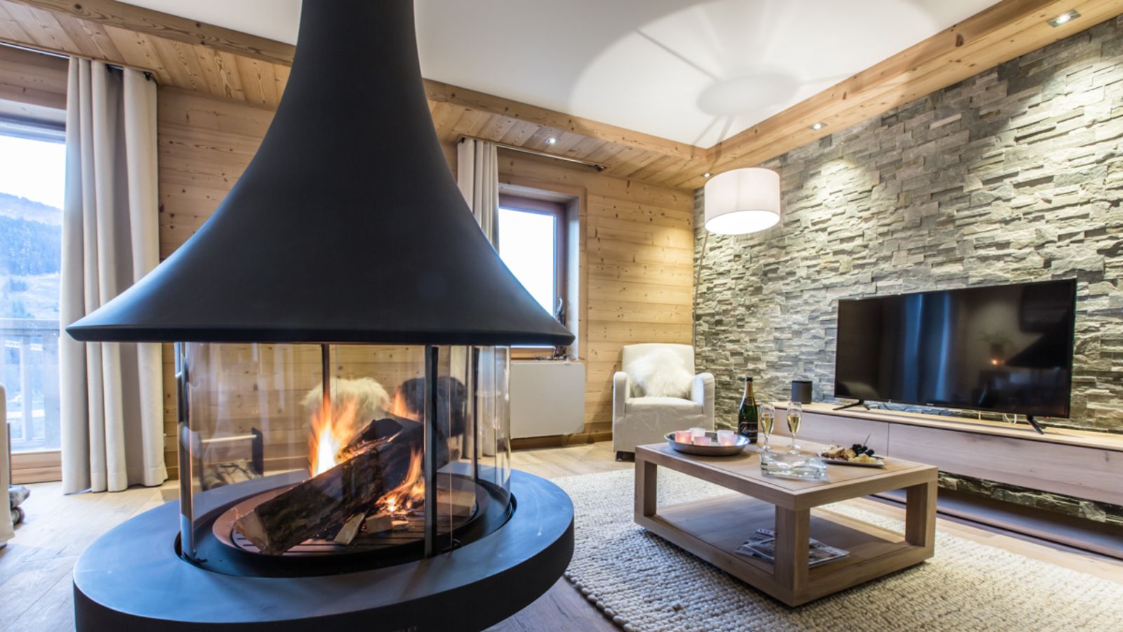 Luxury-Ski-Chalet-Courchevel-1650-Whistler-Lodge-Oxford-Ski-fireplace.jpg