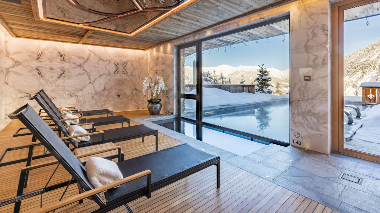 Indoor Outdoor Pool with Spa, Sud Resort, Spa _ Fitness at Ultima Courchevel Belevédère (1).jpg
