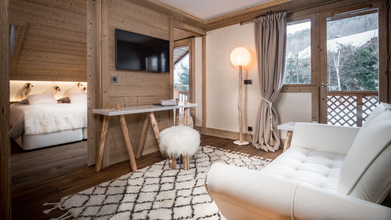 luxury-ski-chalets-meribel-chalet-tyrosolios-oxford-ski-bedroom-lounge.jpg
