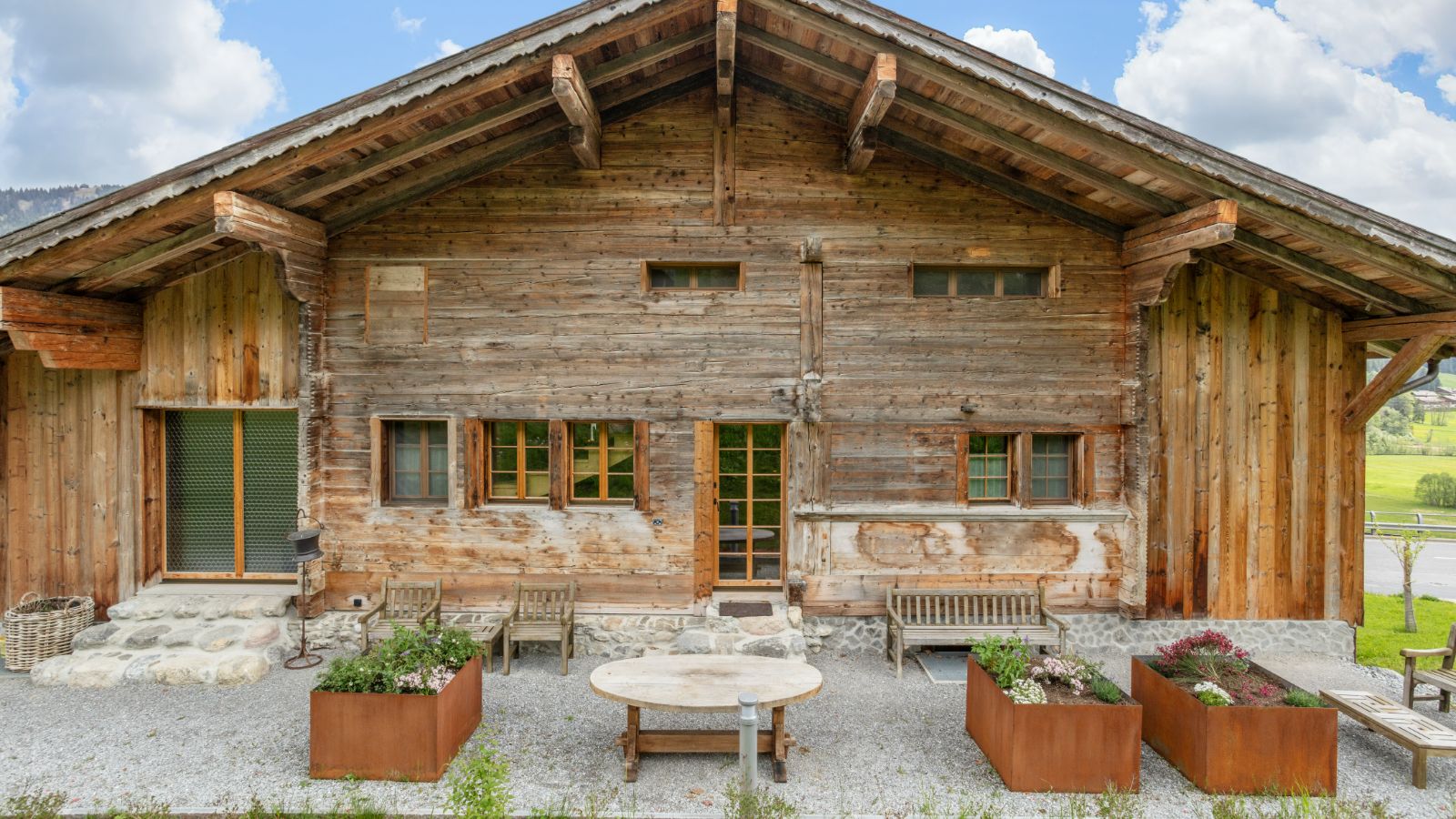 Luxury-Ski-Chalet-Gstaad-Chalet 1808-Exterior seating-Oxford-Ski.jpg