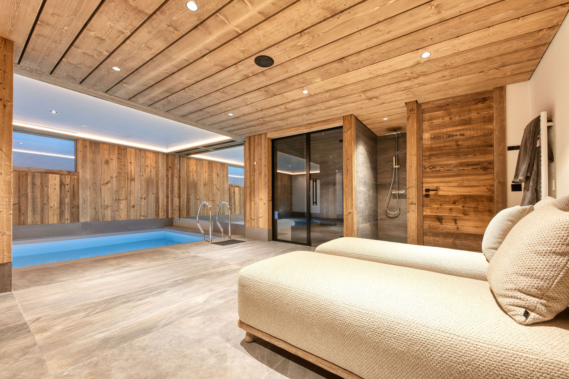 Luxury-ski-chalet-Megeve-Chalet Cascade- Pool seats-Oxford-Ski.jpg
