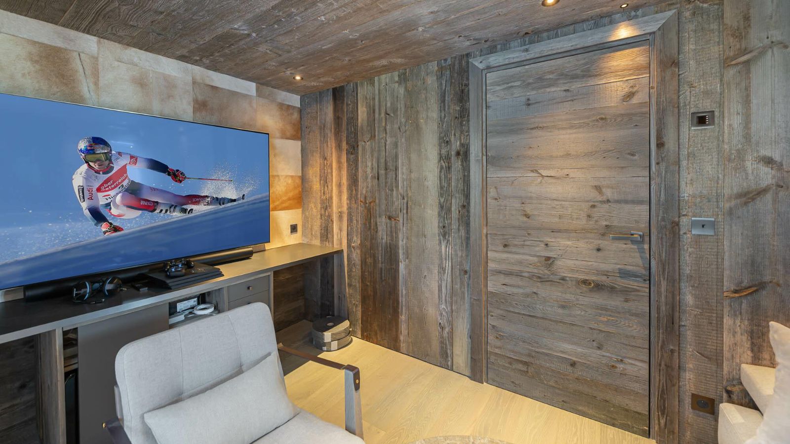 Luxury-Ski-Chalet-Courchevel-1850-Chalet-Bellarossa-Oxford-Ski-TV-Room (6).jpg