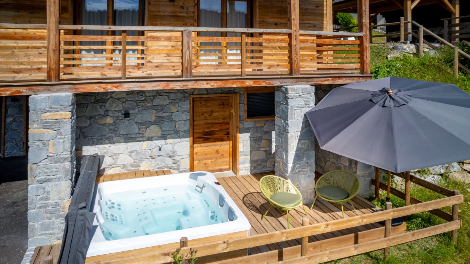 Elevation Alps- Chalet Pavot - lower ground floor terrace with hot tub.jpg
