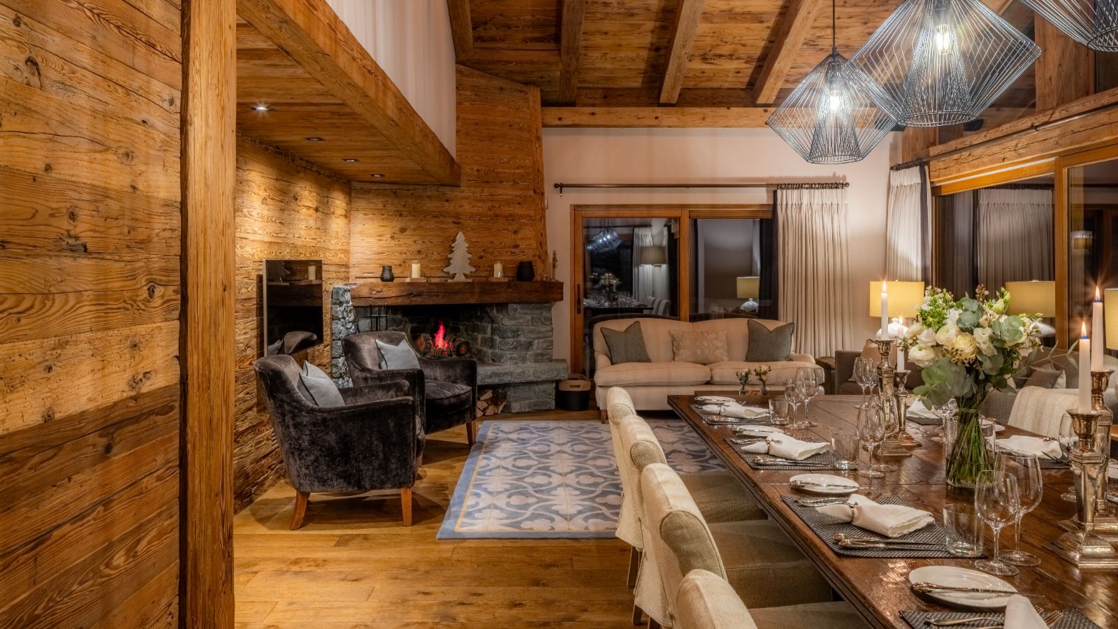 Luxury-ski-chalet-Sirocco -oxford-ski dining room and living room.jpg