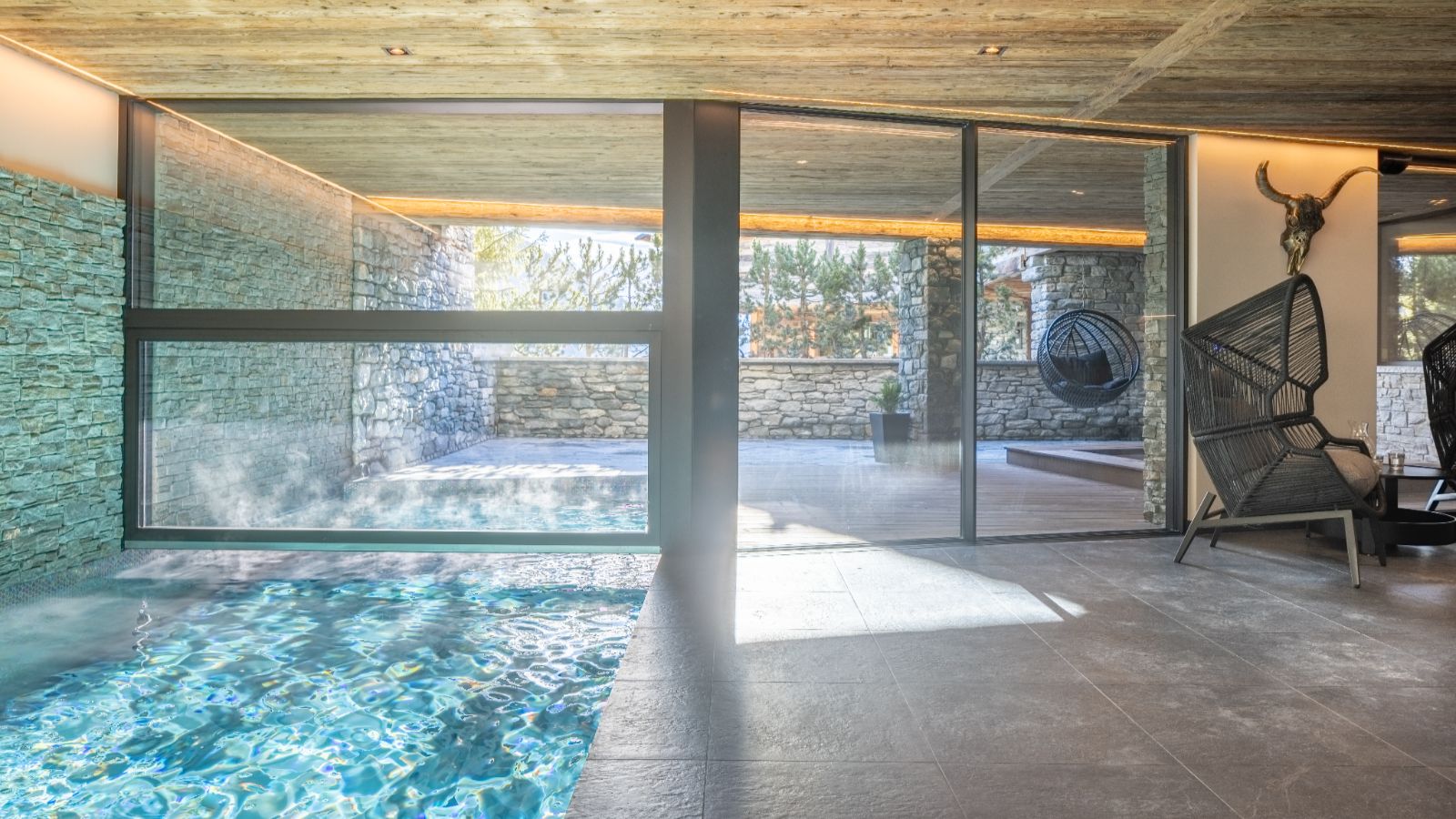 Luxury-ski-chalet-Sirocco -oxford-ski- outdoor swimming pool (2).jpg