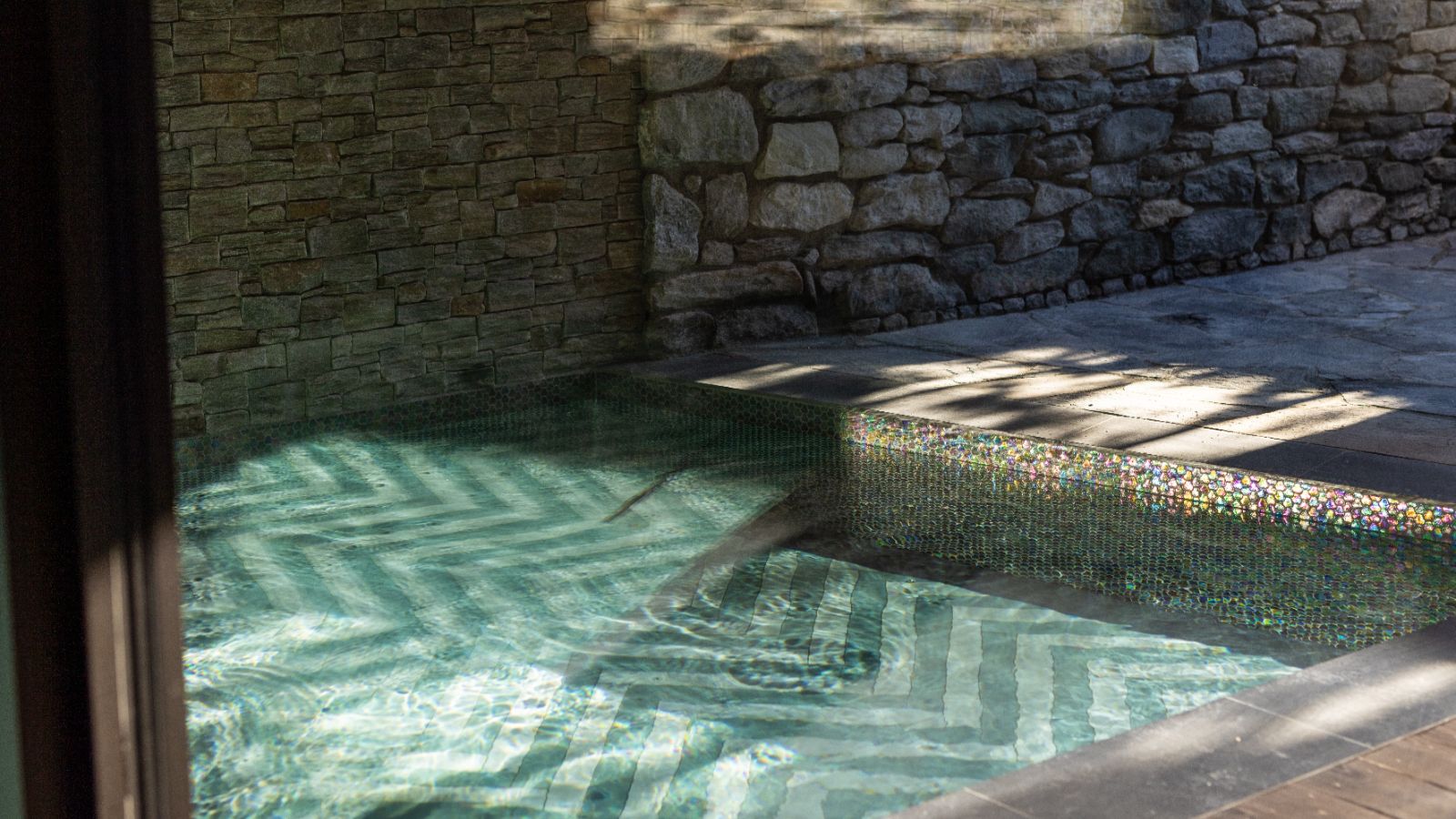 Luxury-ski-chalet-Sirocco -oxford-ski pool reflection.jpg