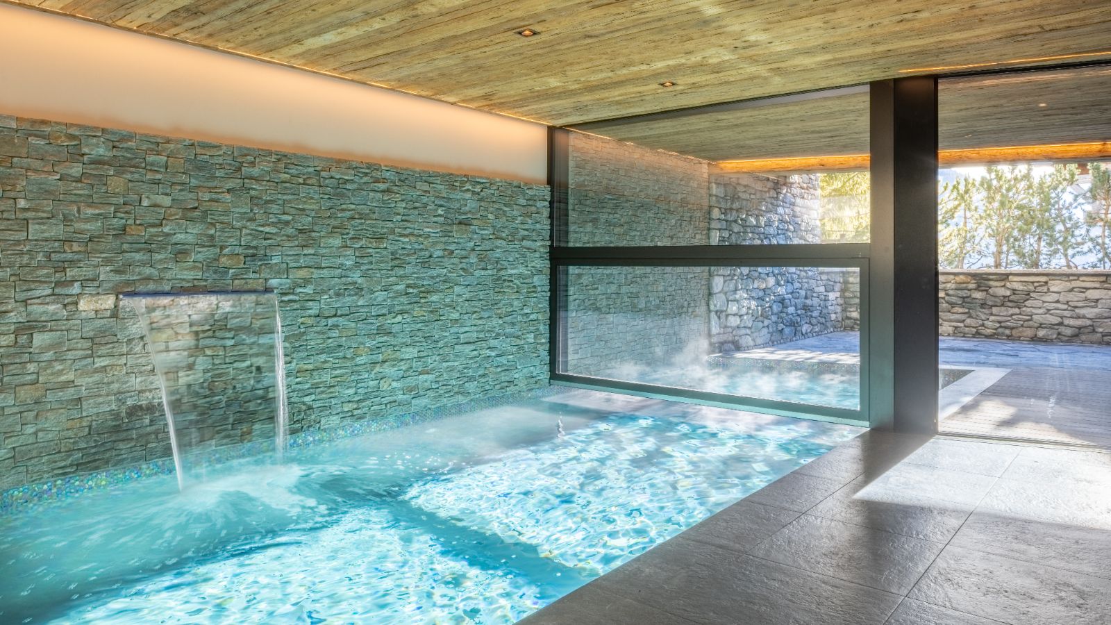 Luxury-ski-chalet-Sirocco -oxford-ski private heated swimming pool.jpg
