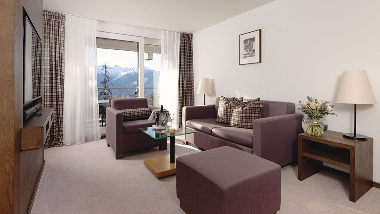 Luxury-Ski-Hotel-Crans-Ambassador-OSC- Bedroom-Lounge.jpg